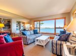 Large living/seating area with ocean views